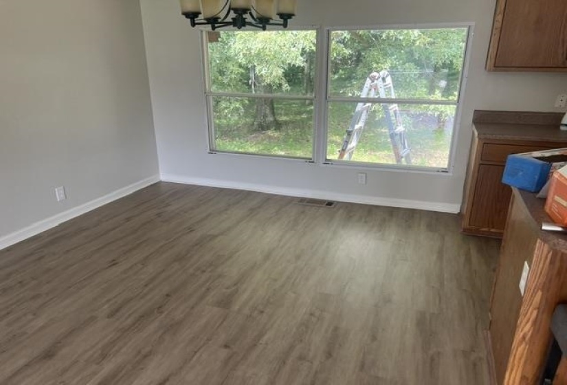 Bright interior space featuring light wood-finish flooring