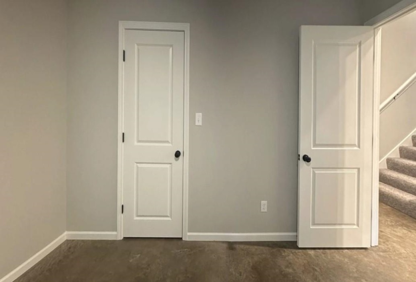 Unfurnished bedroom featuring baseboards