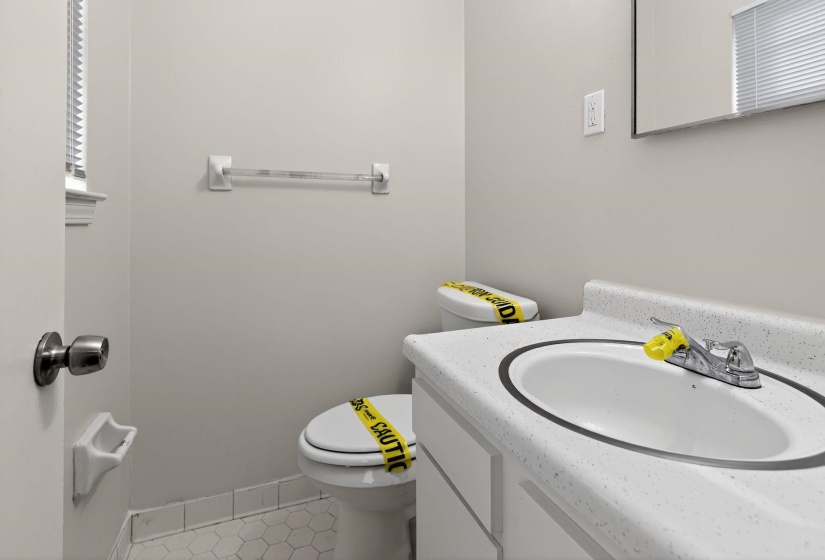 Bathroom featuring vanity and light tile patterned flooring