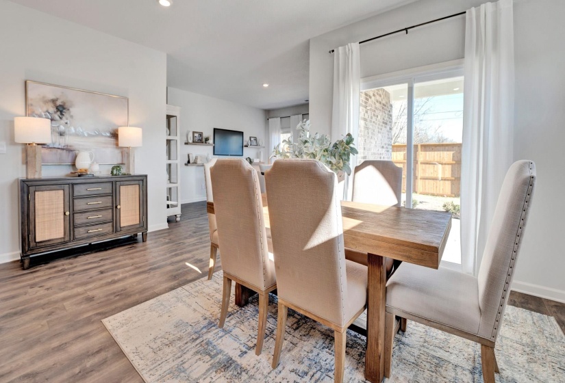 Dining area featuring recessed lighting and wood finished floors
