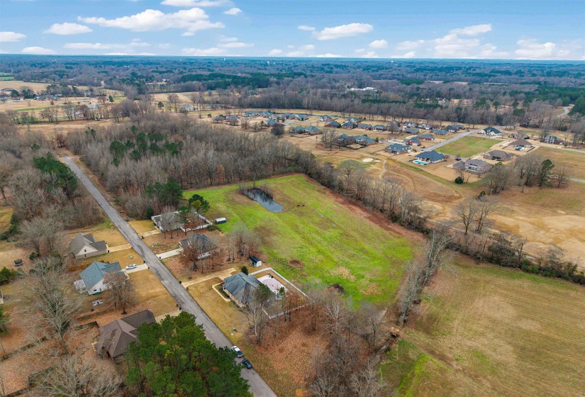 Aerial view of property and surrounding area including Golf Course