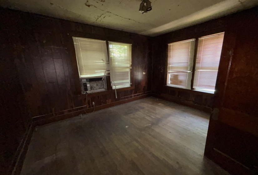 Room featuring wood paneling on walls