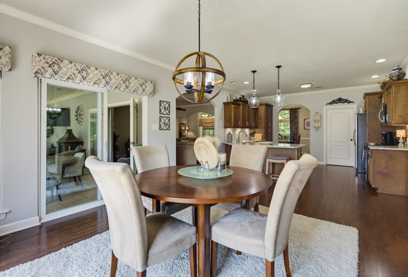Breakfast area connected to kitchen and steps away from sunroom