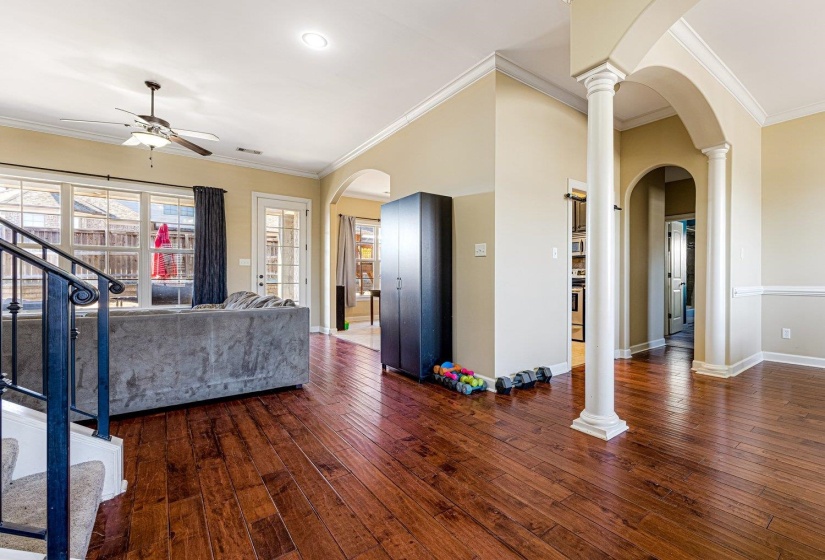 Rich wood-finish flooring throughout the main level