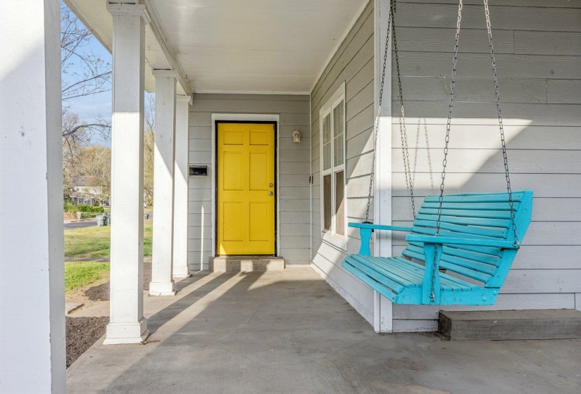 Doorway to property featuring a porch