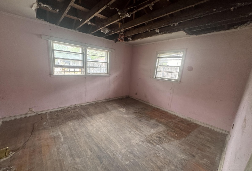 Unfurnished room featuring hardwood / wood-style floors