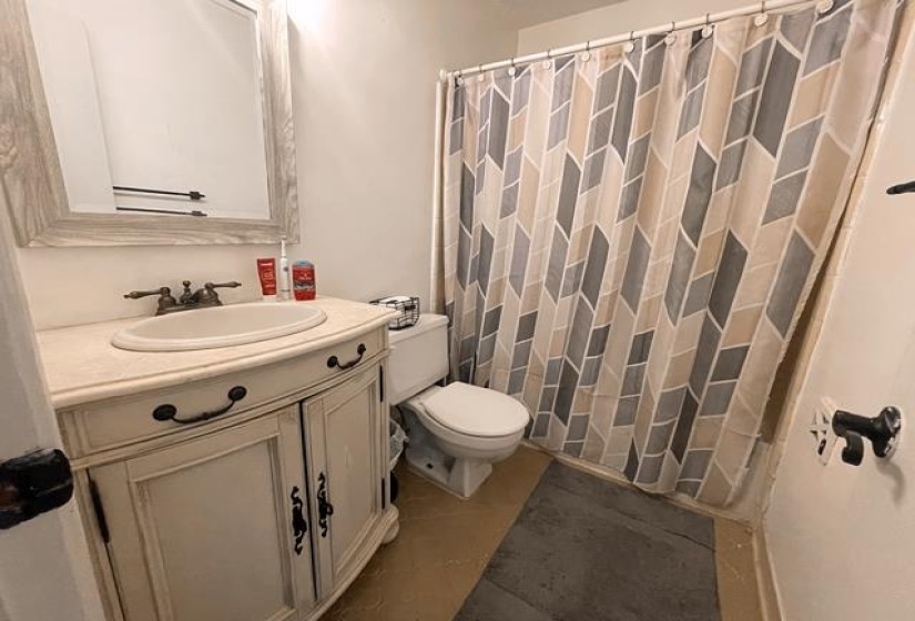 Bathroom with vanity and toilet