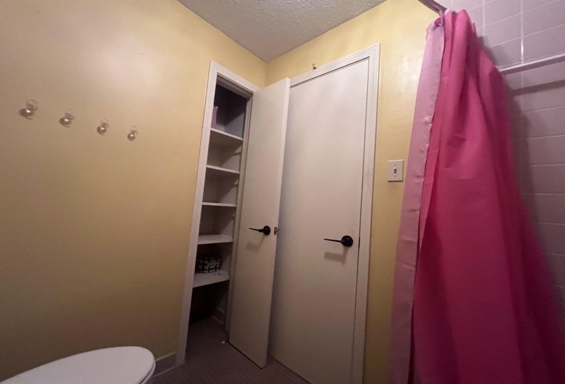Built-in shelving unit providing storage