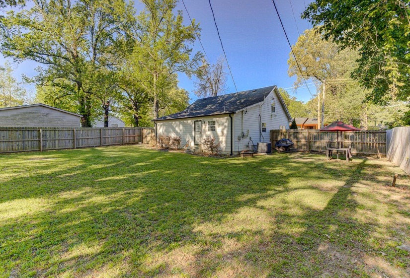 View of fenced backyard