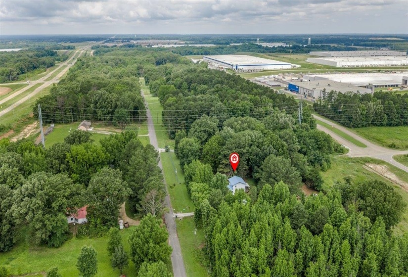 Rural property surrounded by extensive tree coverage