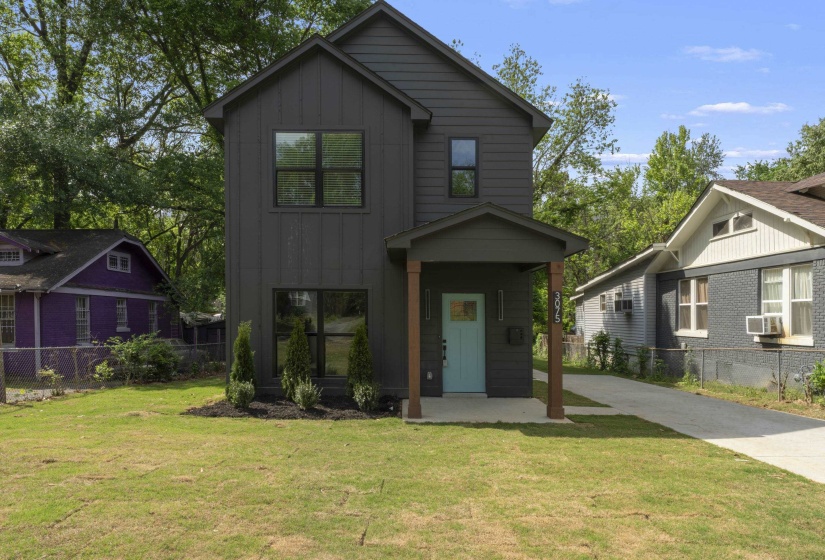 View of front of home with board and batten siding