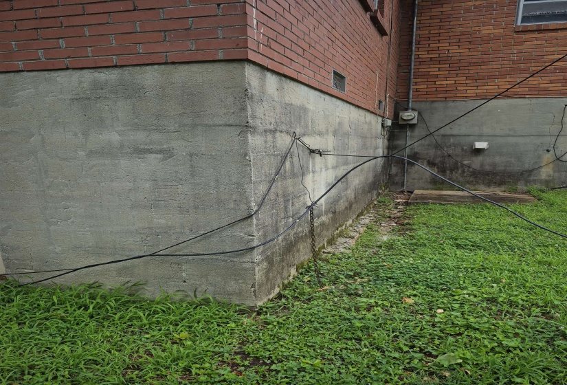 Brick exterior with a concrete foundation