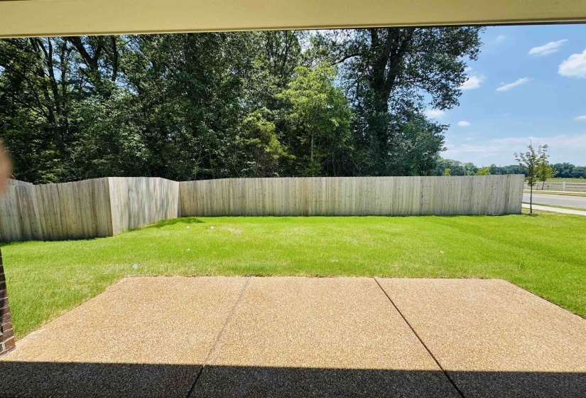 Fenced backyard featuring a patio area