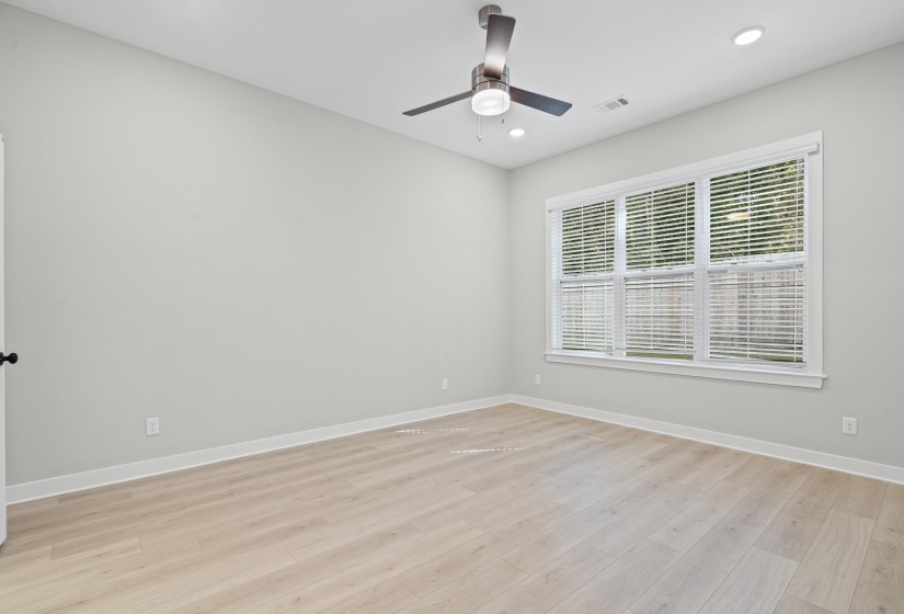 Spare room with light wood-style floors, recessed lighting, and ceiling fan