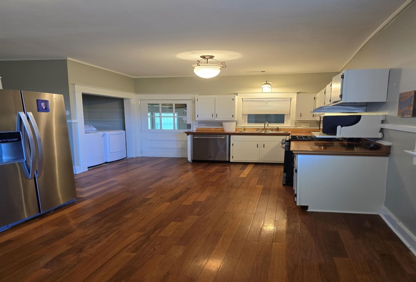 Brazilian Cherrywood countertops, white cabinets ~ Very Open.  Room for Kitchen Bar Stools or Table.