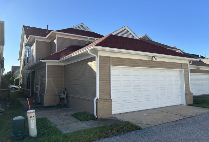 View of front of home featuring a garage