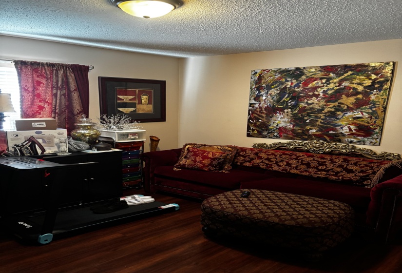 Wood-finish flooring throughout the space