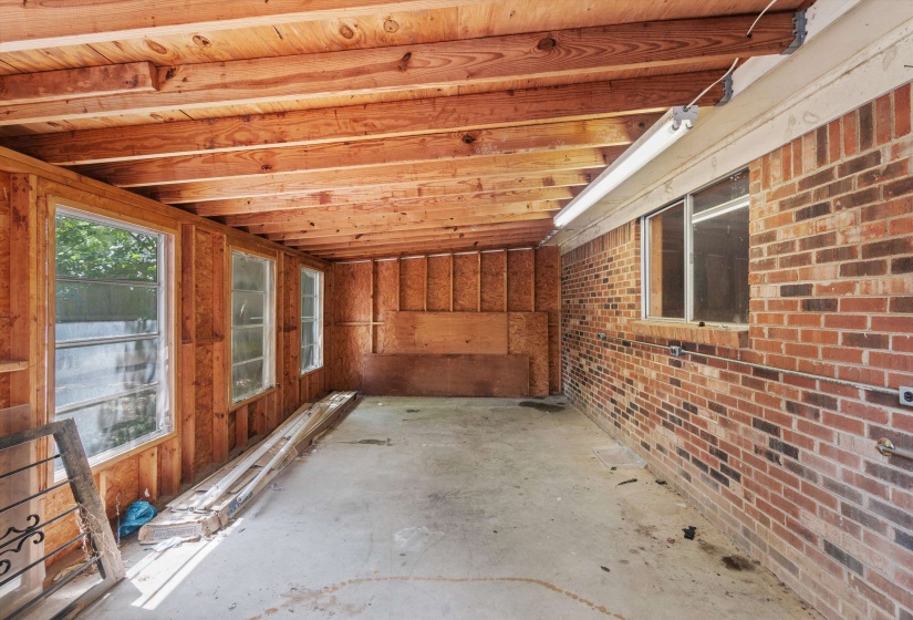 Spacious wired bonus/storage room offering endless possibilities for hobbies, storage, or future expansion.