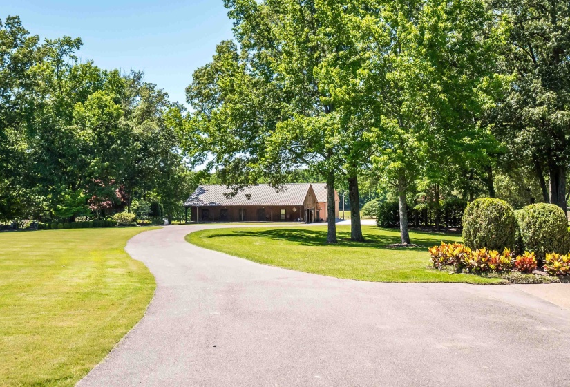 Drive towards original barn and equipment barn