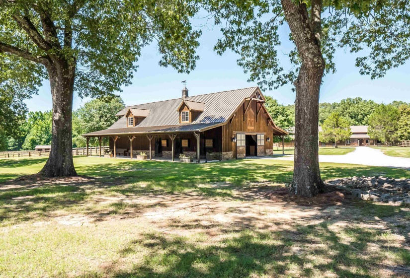 7-stall horse stable with full bath and upstairs apartment