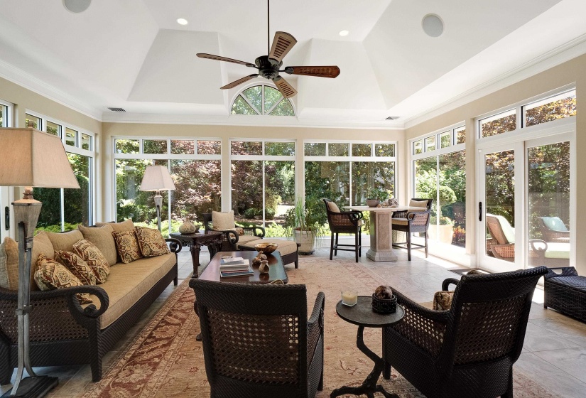 Sunroom with beautiful views of fountain and landscaping