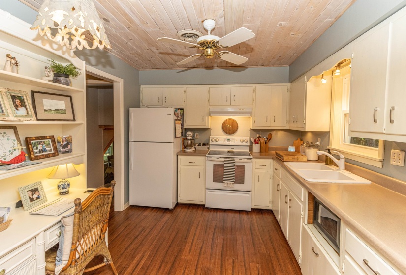 Kitchen featuring wood ceiling, sink, dark hardwood / wood-style flooring, and white appliances