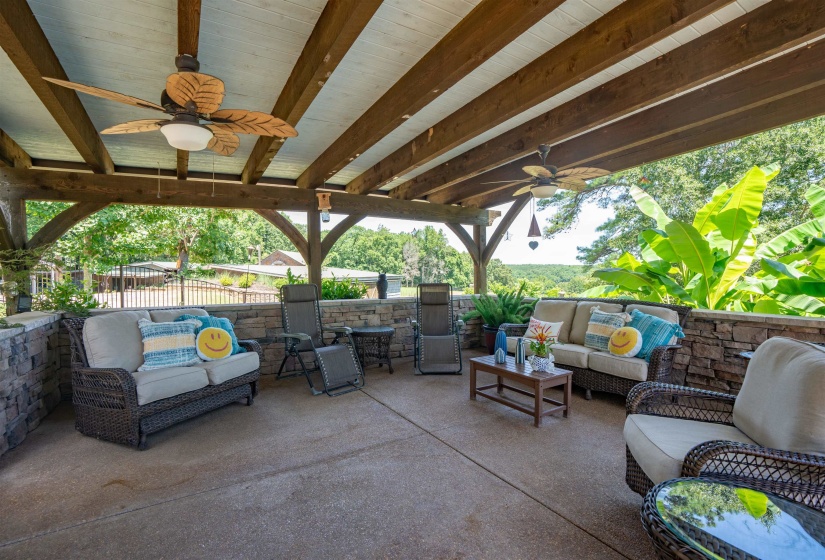 View of patio featuring outdoor lounge area and ceiling fan