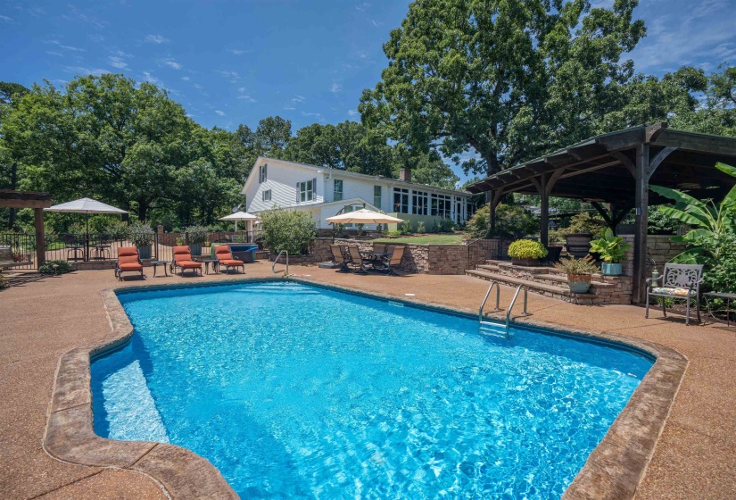 View of swimming pool with a patio and a gazebo