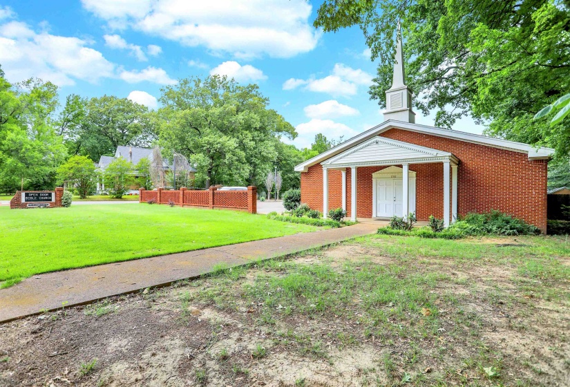View of front of house with a front yard