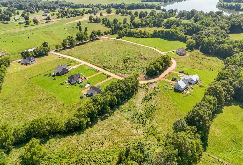 Overview of rural landscape with a nearby body of water