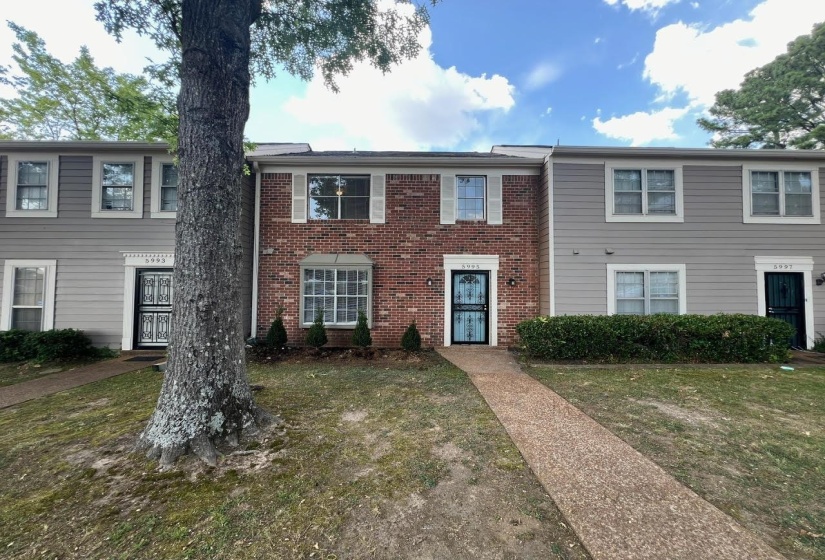 View of front of property with a front lawn