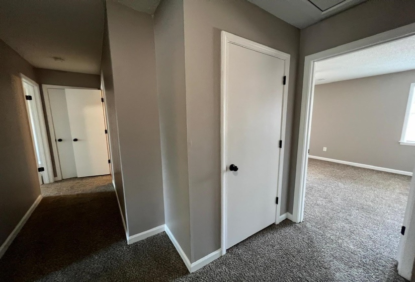 Corridor with carpet floors