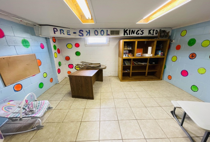 Game room featuring light tile patterned floors