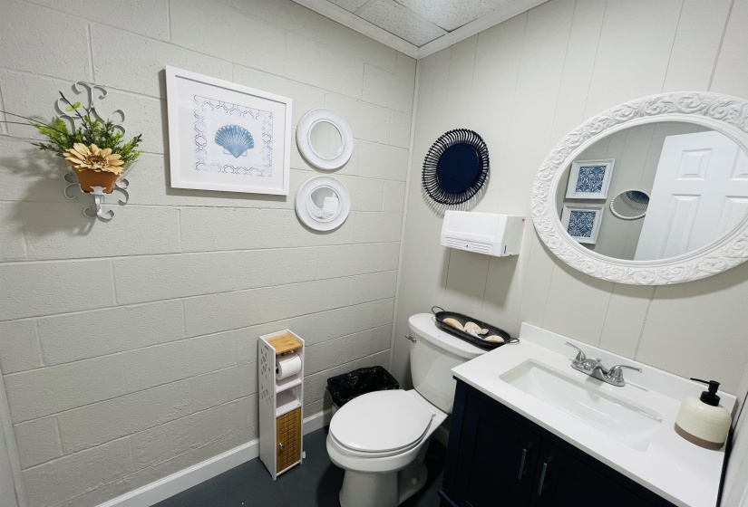 Bathroom featuring vanity and toilet
