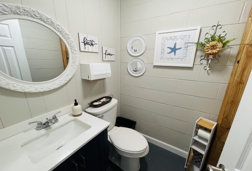 Bathroom featuring vanity and toilet