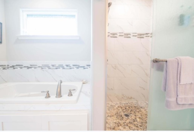 Bathroom with independent shower and bath