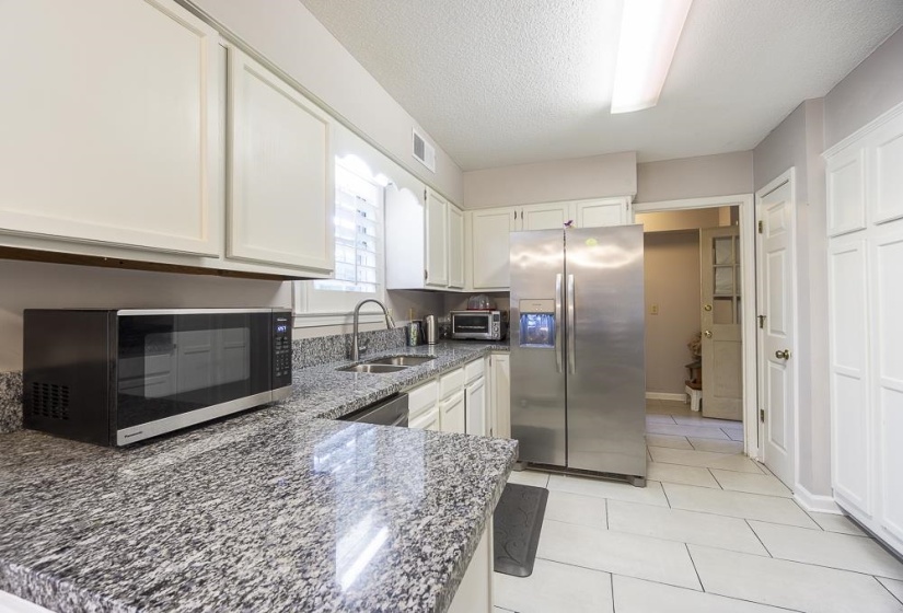 All appliances in kitchen and laundry will remain.