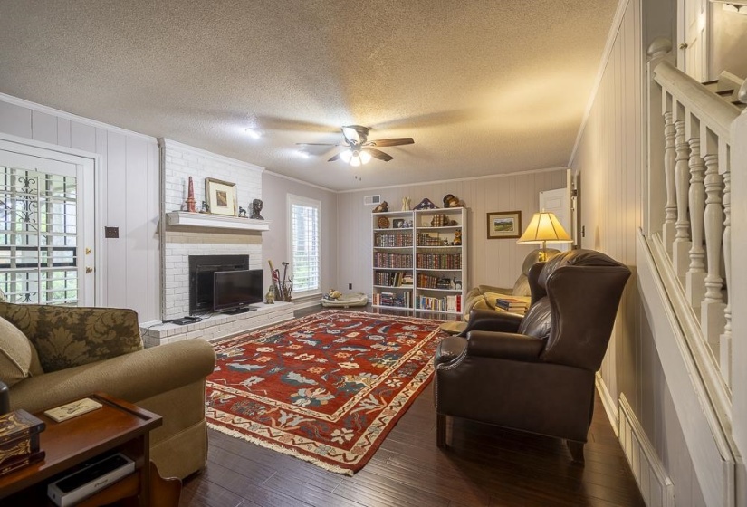 Big Den has a fireplace and built-in bookcases.