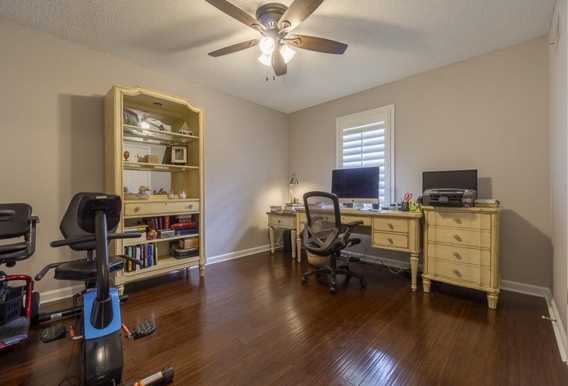 One of the downstairs bedrooms being used as an office.