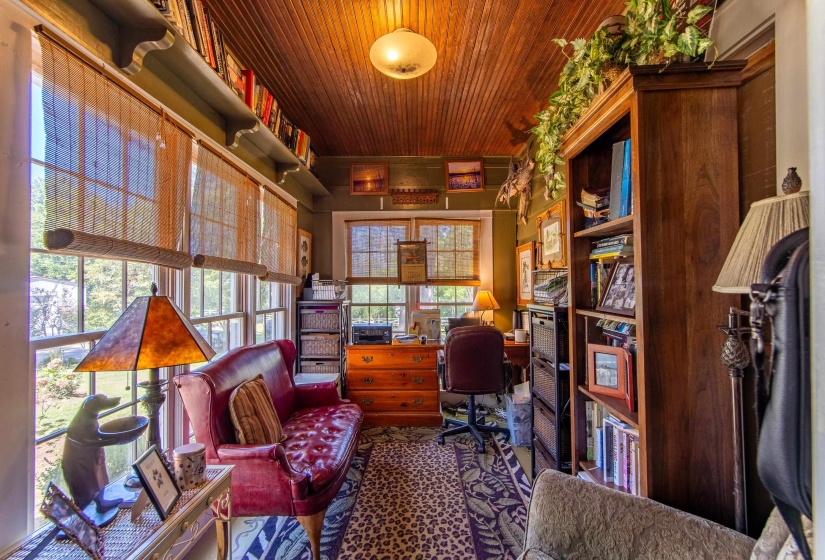 Office space featuring wooden ceiling