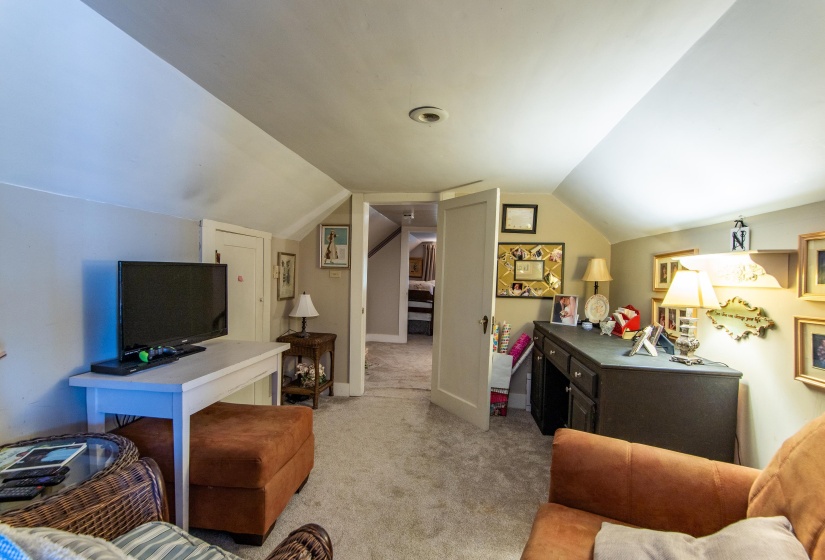 Interior space featuring vaulted ceiling