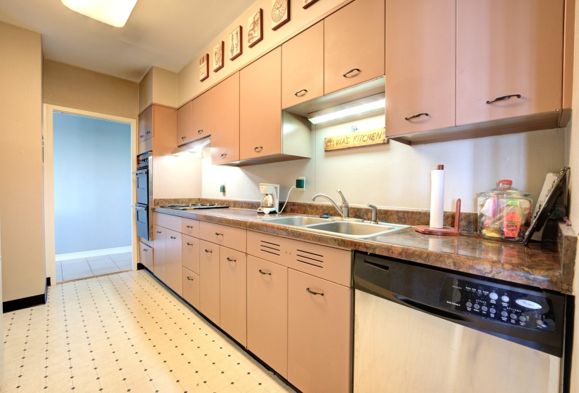 Kitchen with stainless steel appliances and sink