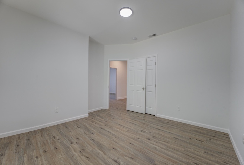 Empty room with light wood-type flooring