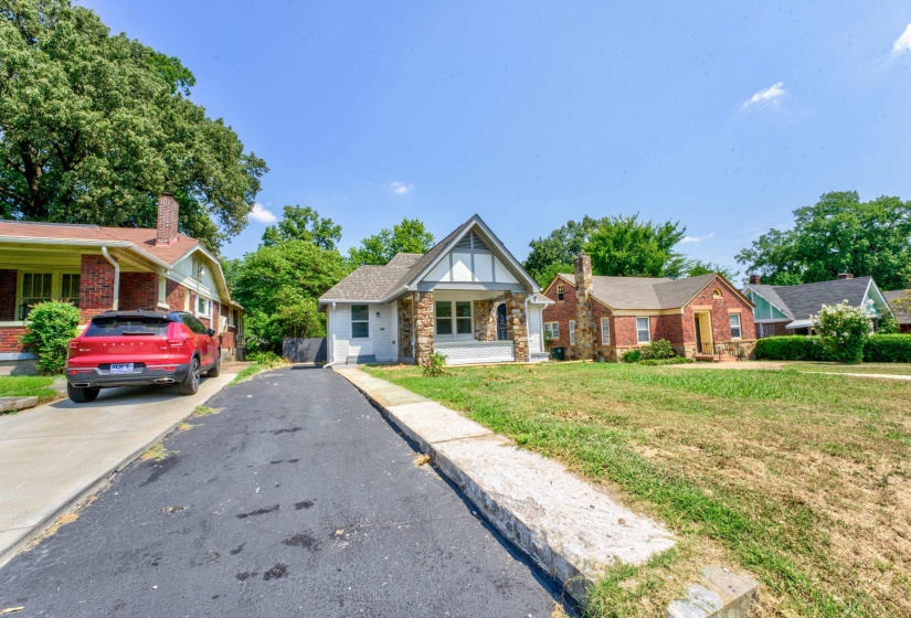 View of front of property with a front yard