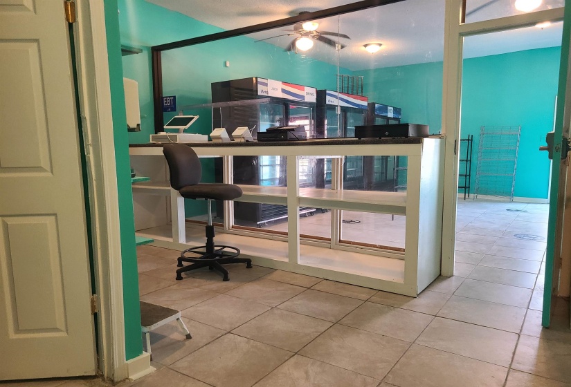 Tiled office space with ceiling fan