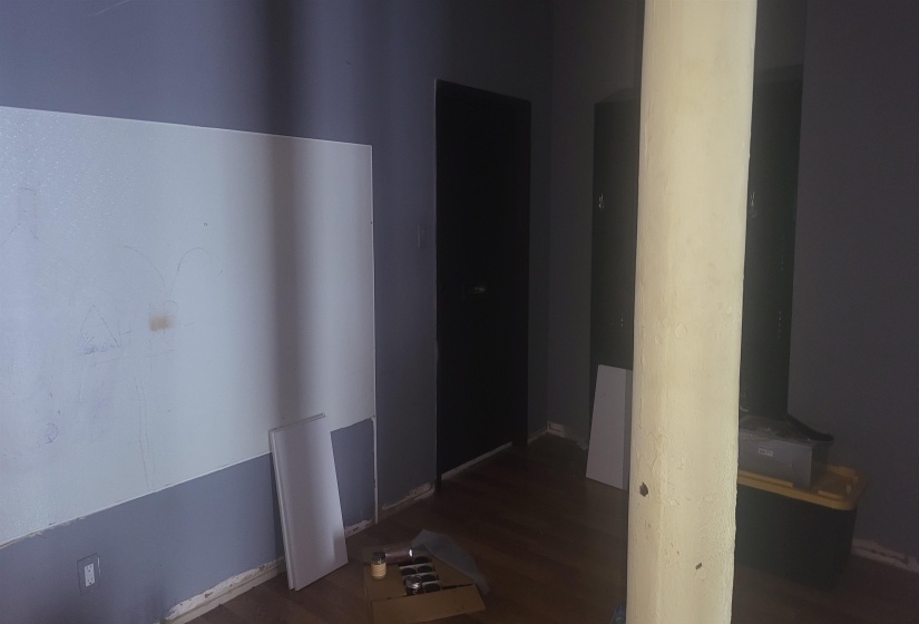 Corridor with dark wood-type flooring