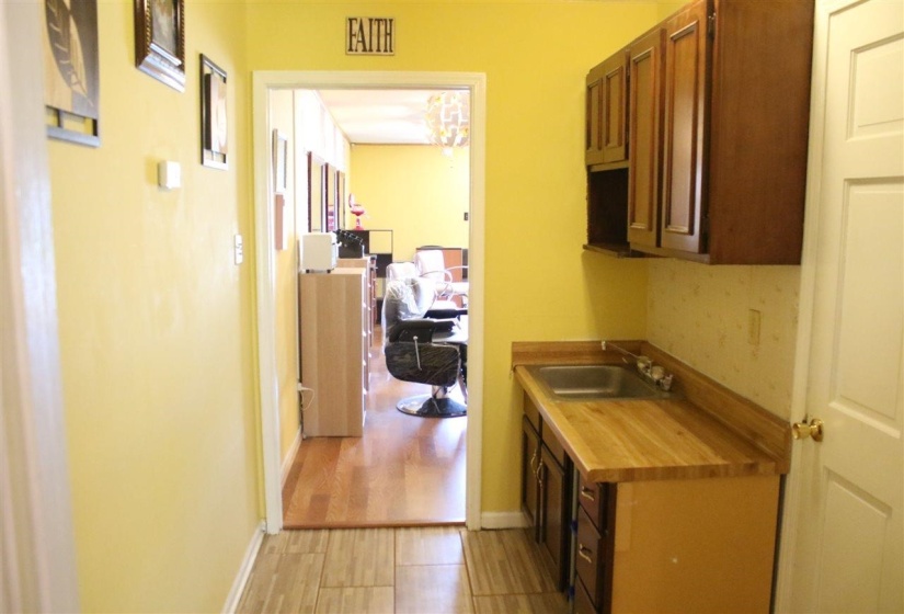 Kitchen featuring sink and light wood-type flooring