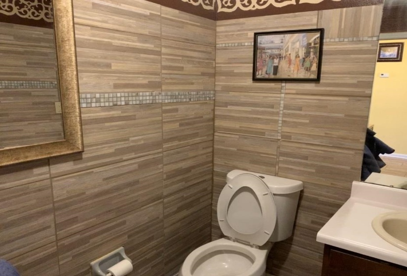 Bathroom with vanity and toilet