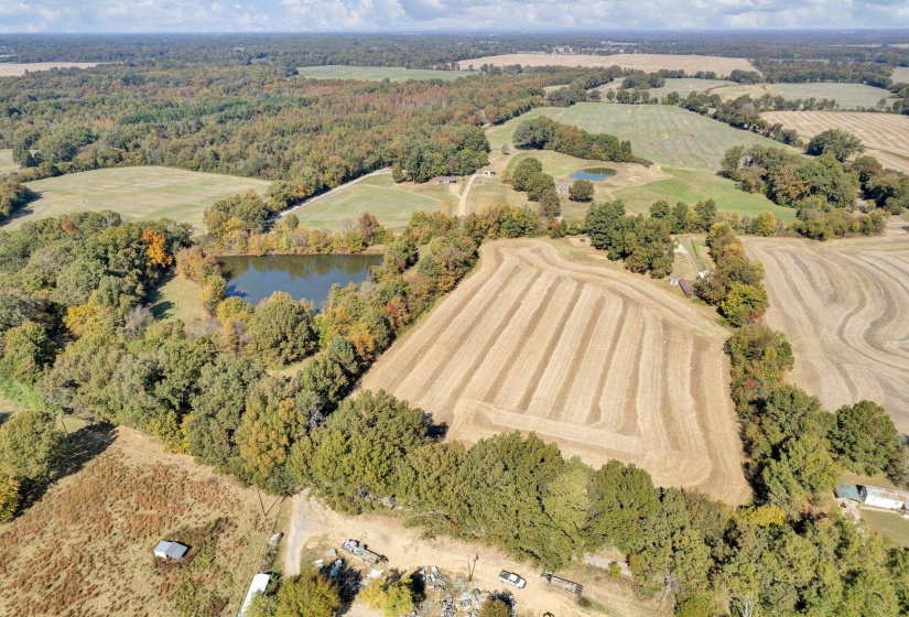 Aerial view featuring a water view and a rural view