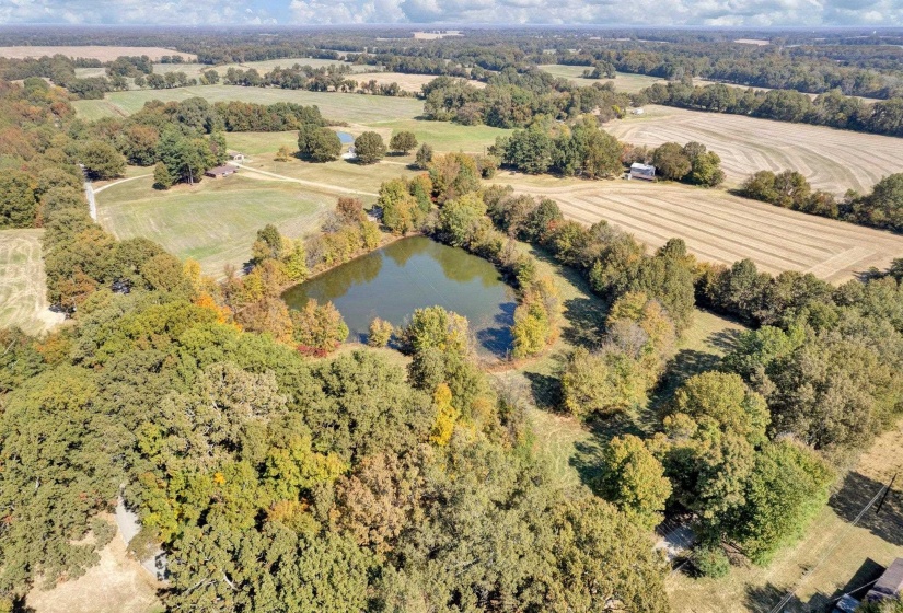 Aerial view featuring a water view and a rural view